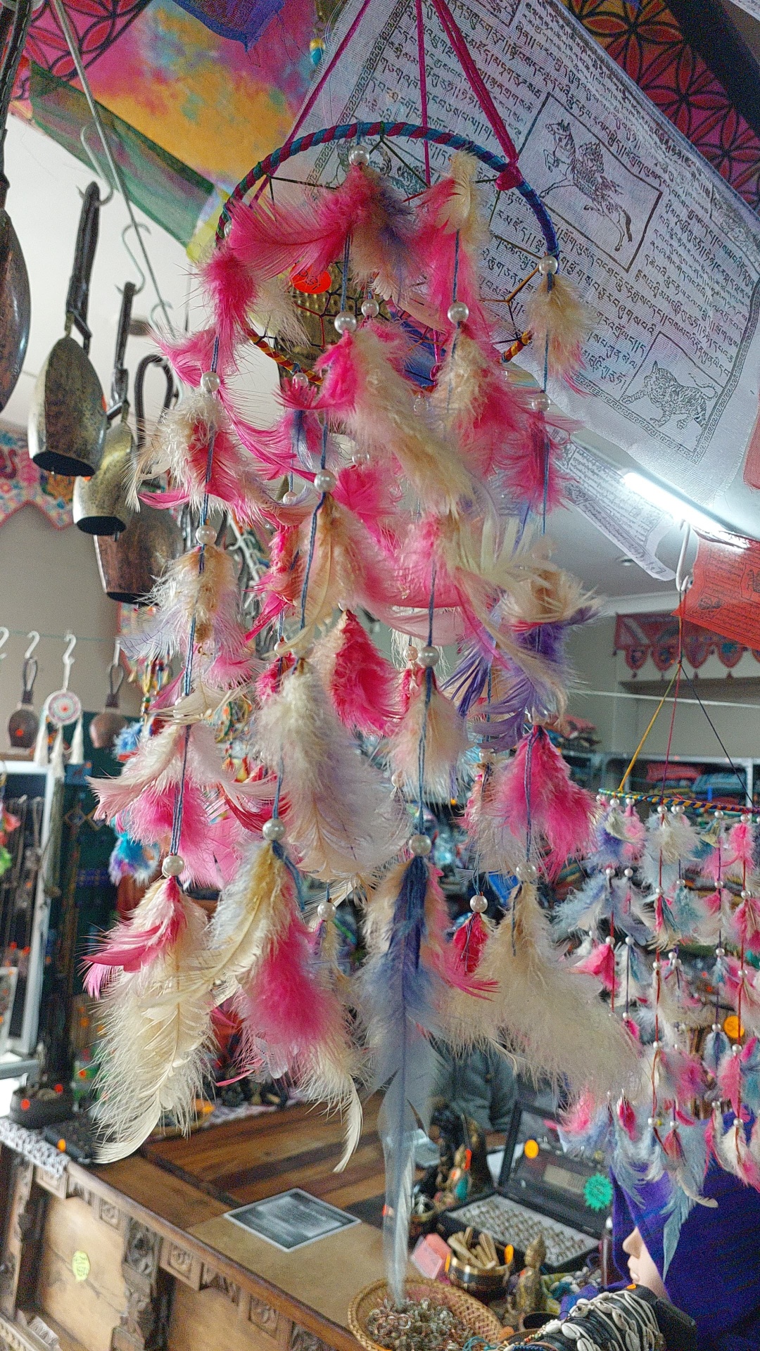Handmade dreamcatchers with feathers and colourful beads